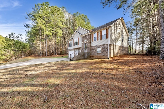 raised ranch featuring a garage