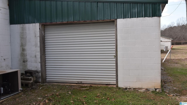 view of outbuilding with a garage