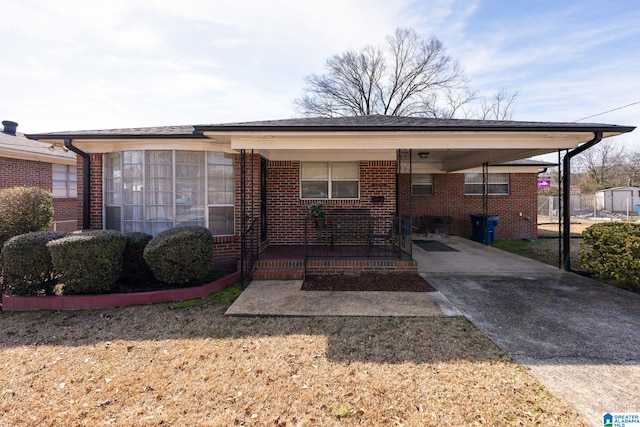 view of front of house with a carport