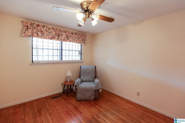 unfurnished room featuring hardwood / wood-style flooring and ceiling fan