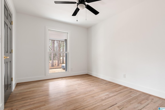 spare room with light wood-type flooring