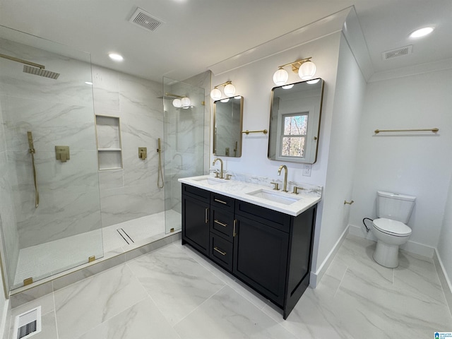 bathroom with crown molding, a tile shower, vanity, and toilet