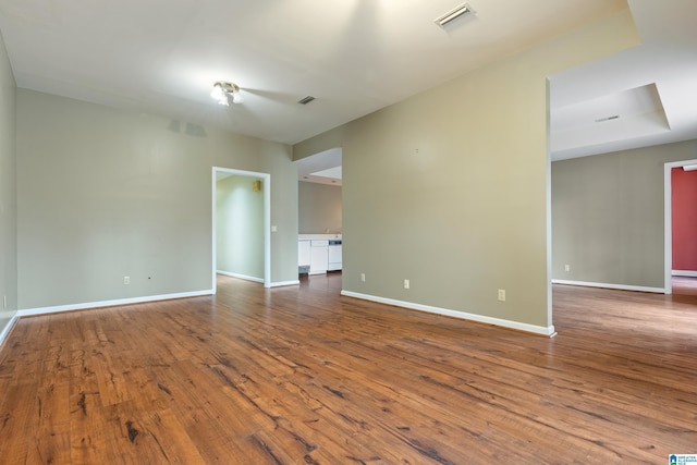 empty room featuring hardwood / wood-style flooring