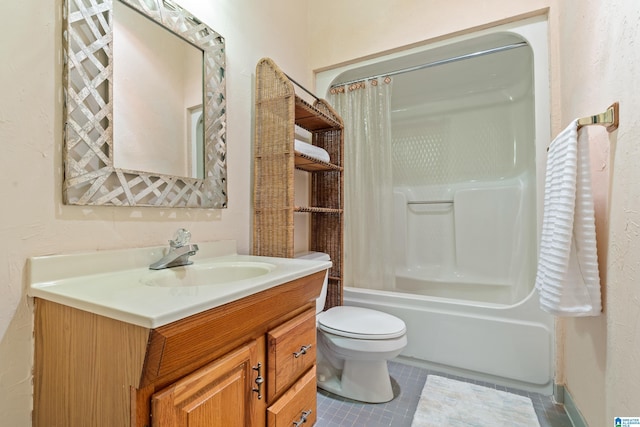 full bathroom with vanity, tile patterned floors, toilet, and shower / bath combo with shower curtain