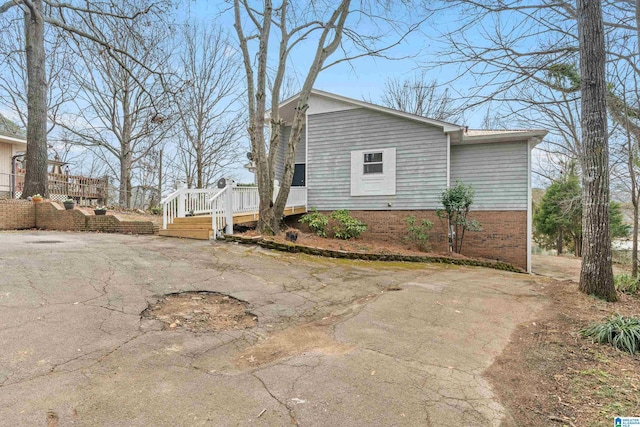 exterior space with a wooden deck