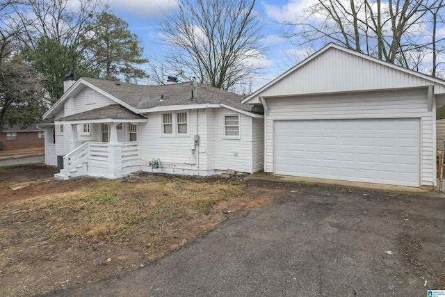 single story home featuring a garage