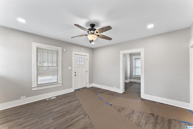 entrance foyer featuring ceiling fan and dark hardwood / wood-style flooring