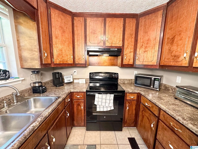 kitchen with light tile patterned flooring, sink, stone countertops, a textured ceiling, and black range with electric stovetop