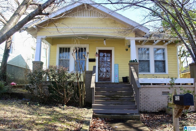 bungalow-style home featuring covered porch