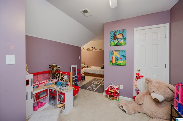 playroom featuring lofted ceiling and carpet floors