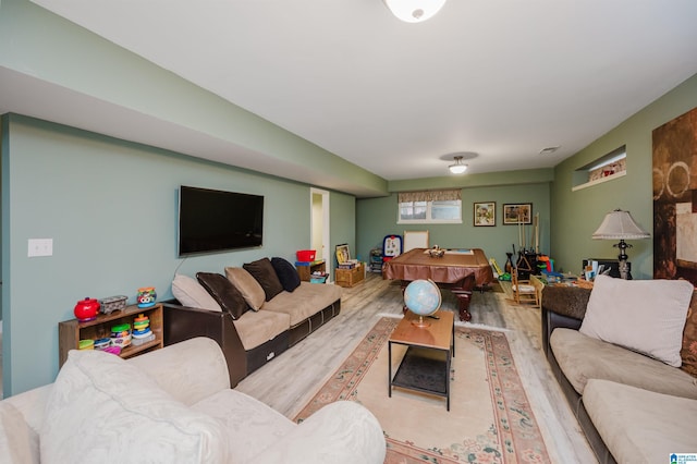 living room with light hardwood / wood-style floors