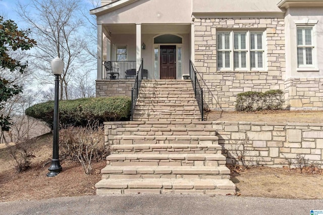 property entrance featuring covered porch