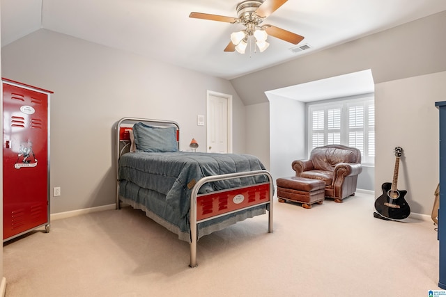 bedroom featuring ceiling fan, lofted ceiling, and carpet