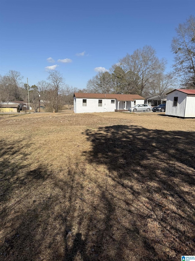 exterior space with a front lawn