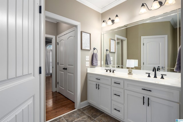 bathroom featuring vanity and crown molding