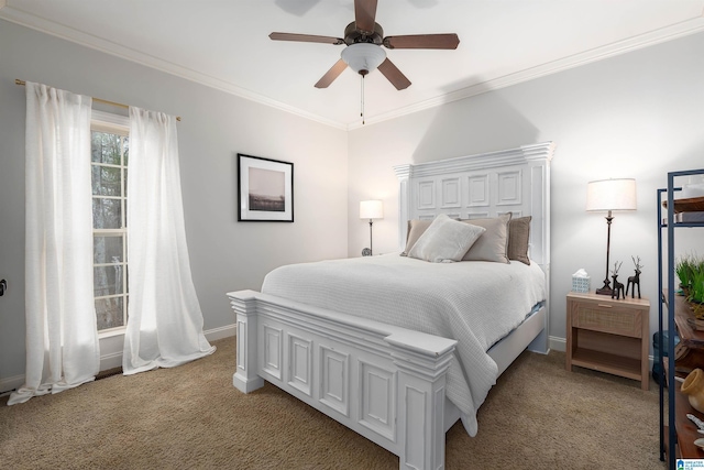 bedroom featuring crown molding, carpet floors, and ceiling fan