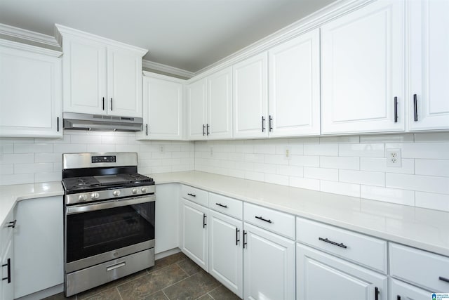 kitchen with tasteful backsplash, ornamental molding, stainless steel range with gas cooktop, and white cabinets