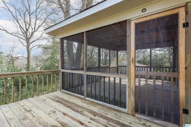 deck featuring a sunroom