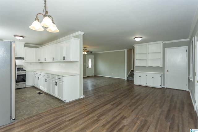 kitchen featuring under cabinet range hood, open floor plan, ornamental molding, appliances with stainless steel finishes, and white cabinets