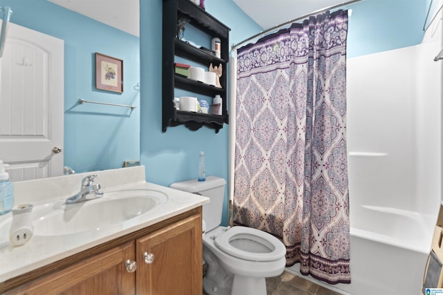 full bathroom featuring vanity, shower / bath combination with curtain, tile patterned floors, and toilet