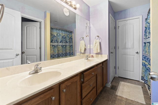 bathroom with vanity and tile patterned floors