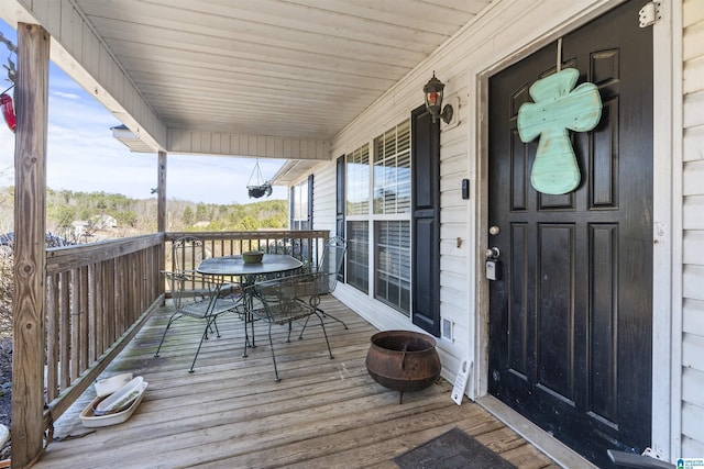 wooden deck featuring a porch