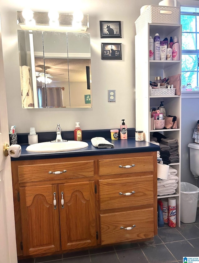 bathroom featuring tile patterned floors and vanity