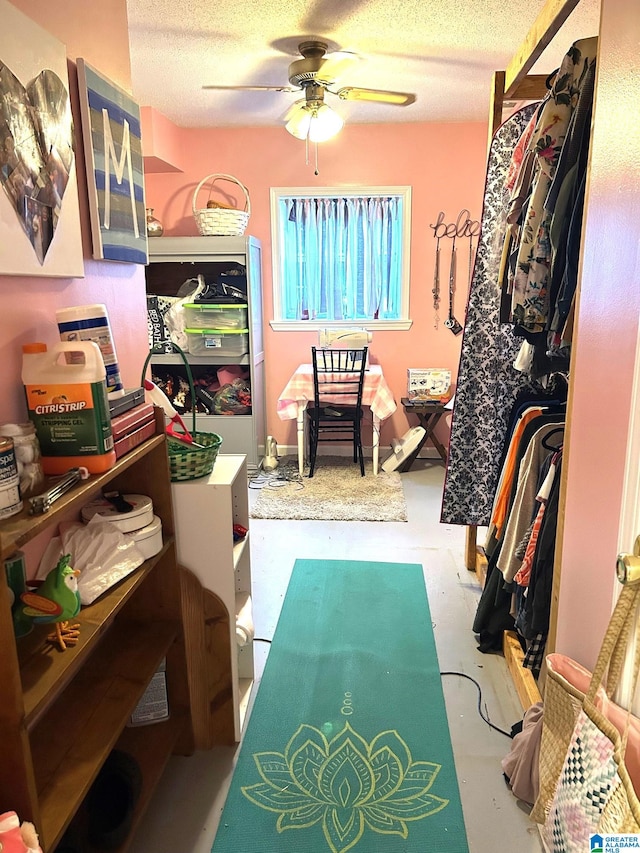 interior space featuring ceiling fan