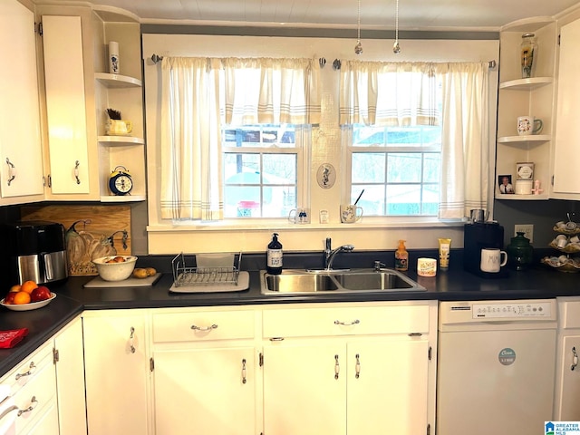 kitchen with white cabinetry, sink, plenty of natural light, and dishwasher