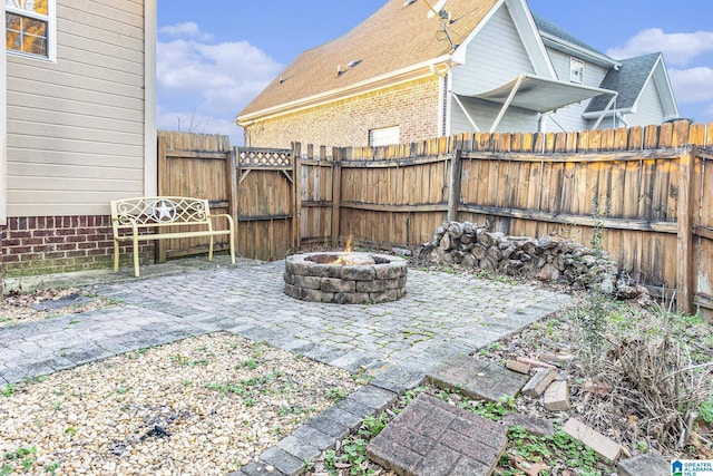 view of patio / terrace featuring a fire pit