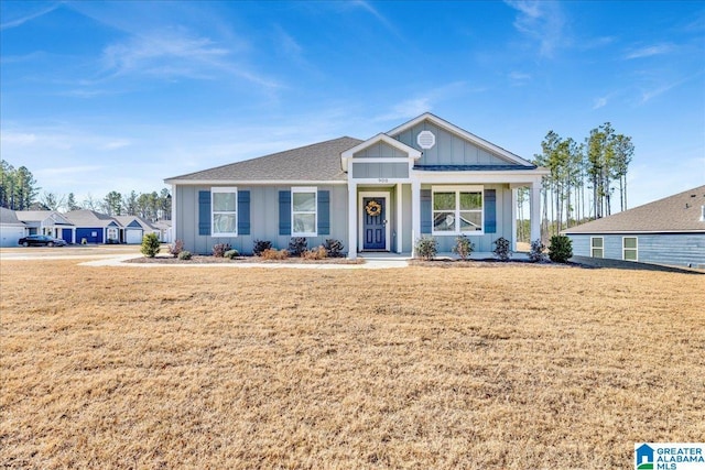 view of front of home featuring a porch and a front yard