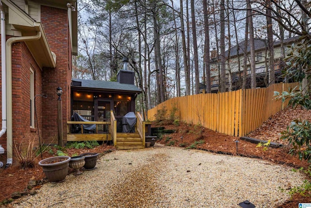 view of yard with a sunroom