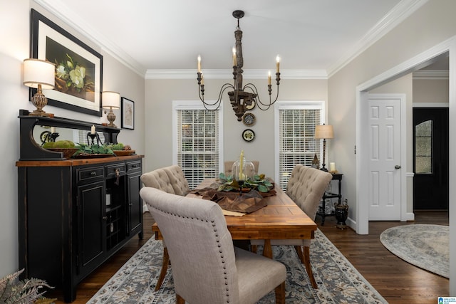 dining area with an inviting chandelier, crown molding, and dark wood-type flooring