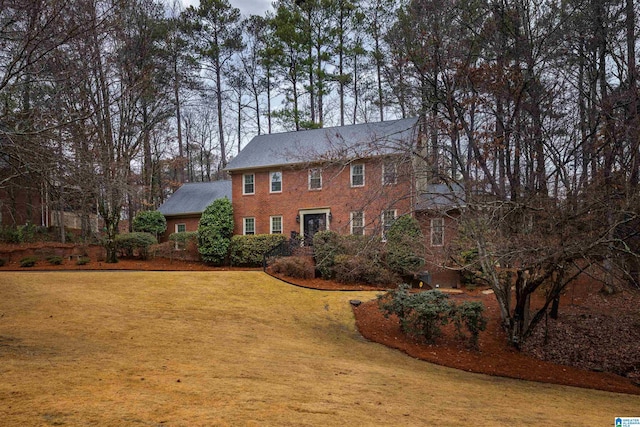 exterior space with a front lawn