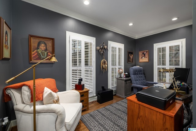 home office with hardwood / wood-style flooring and ornamental molding