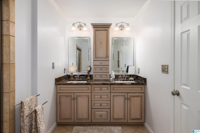 bathroom with ornamental molding, tile patterned flooring, and vanity