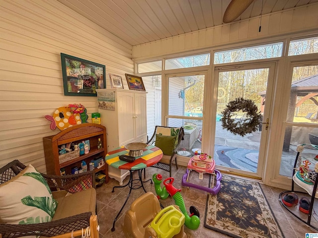 sunroom featuring wooden ceiling