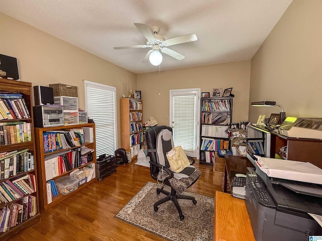 office area with ceiling fan and hardwood / wood-style floors