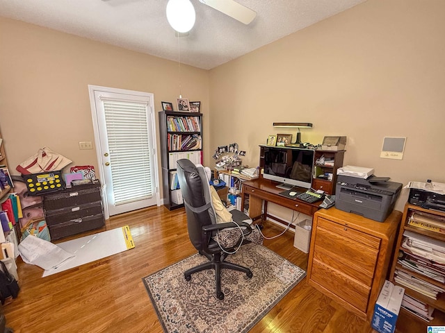 office featuring ceiling fan and hardwood / wood-style floors