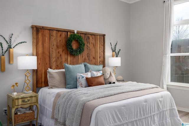 bedroom featuring hardwood / wood-style floors