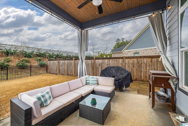 view of patio with area for grilling, outdoor lounge area, and ceiling fan