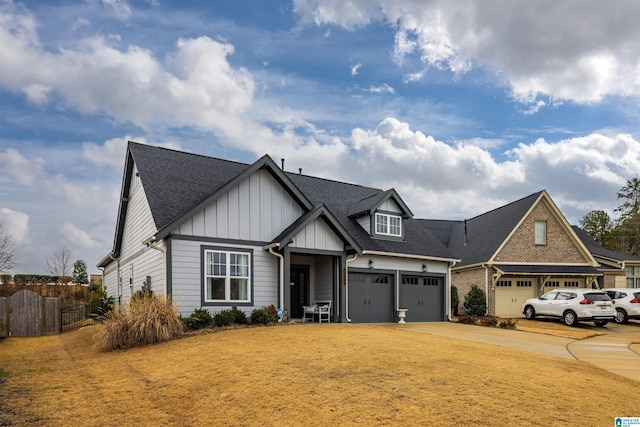 view of front of property with a garage and a front yard