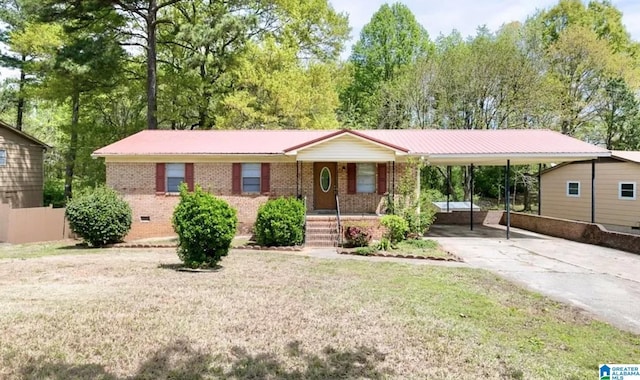 single story home featuring a carport and a front yard