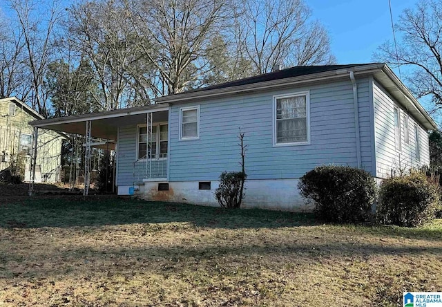 view of property exterior featuring a yard