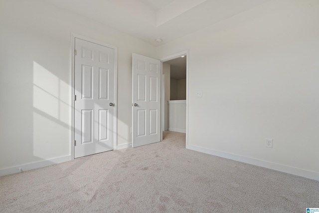 unfurnished bedroom with carpet flooring