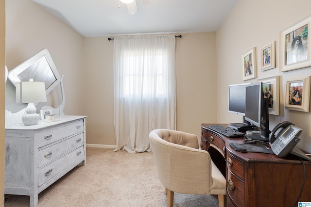 office space with ceiling fan and light colored carpet