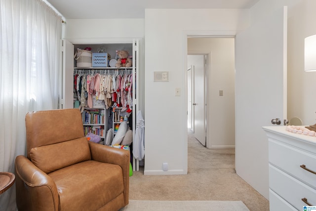 sitting room with light colored carpet