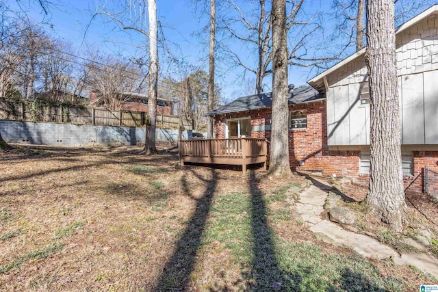 view of yard featuring a deck