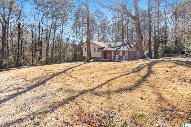 view of yard featuring a porch