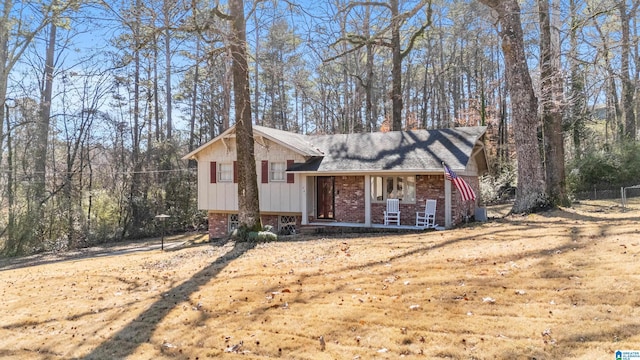 split level home featuring covered porch